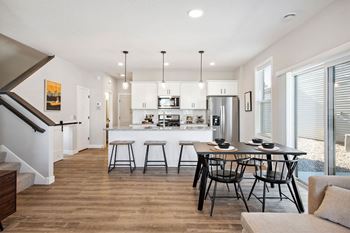 Open concept kitchen with designated dining area